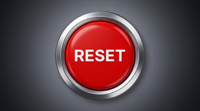 A glossy red metallic reset button centered on a neutral background for software interface and web UI design