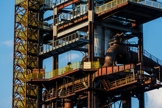 View of the industrial steel structures and yellow staircases of the Dolni Vitkovice complex in Ostrava, Moravian-Silesian Reg, Czechia.