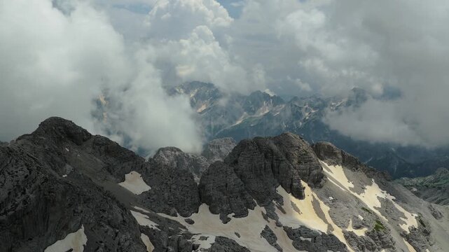 Aerial Approach Over Jagged Snowy Ridges Near Jezerca Albania