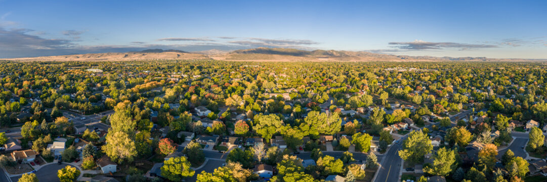 Fort Collins and foothills of Rocky Mountains in Colorado - aerial panorama of early fall morning scenery