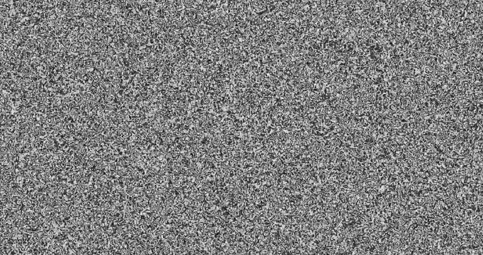 Vintage television static in monochrome creates grainy signal. Old Retro TV - Static tv black and white noise caused by bad signal reception. Loop animation