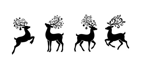 Set of four decorative black silhouettes of reindeer with ornate swirling antlers isolated on white background © Aisu