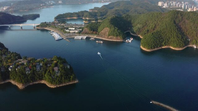 Aerial View of Forested Islands and Marina on Qiandao Lake in Zhejiang, China in Qiandao Lake, Zhejiang, China