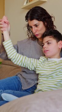 Loving mother cares for child with cerebral palsy
