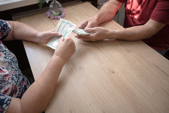 US dollars; the difficult financial situation of an elderly couple.
