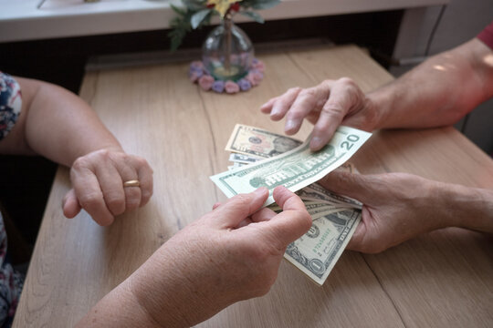 US dollars; the difficult financial situation of an elderly couple.
