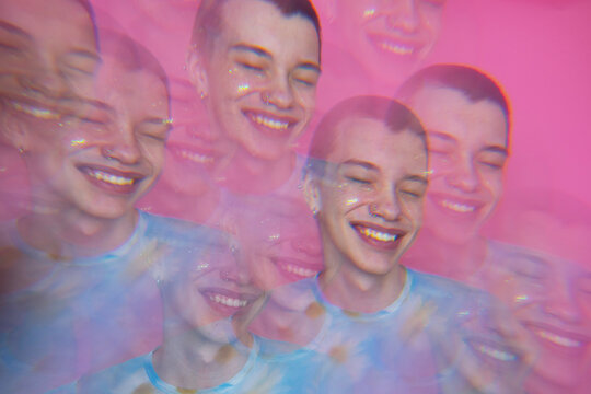 Happy Young Man on pink background.