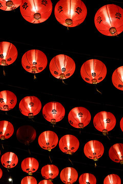 Glowing Red Lanterns Against Dark Sky