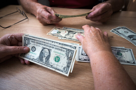 US dollars; the difficult financial situation of an elderly couple.
