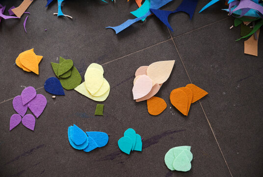 Closeup of cut decorative paper materials on the ground