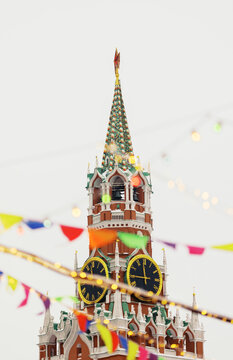Kremlin Clock Tower With Colorful Decorations During a Festival
