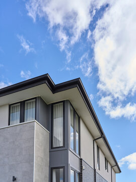 Modern House Under a Blue Sky With Clouds