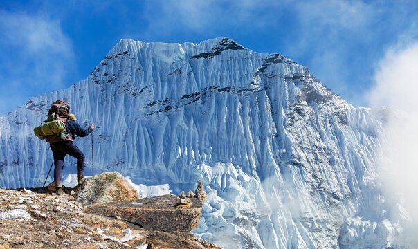 tourist or hiker glacial moraine Nepal Himalaya mountain