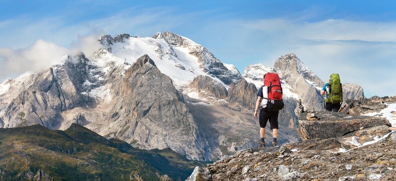 mount Marmolada two tourists Alps Dolomites mountains