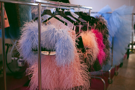 Fluffy ostrich feathered clothing collection on the clothing rack