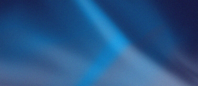 Abstract blue light beam background with grainy texture and soft gradient shadows is excellent for cinematic title slides and minimalist corporate banners.