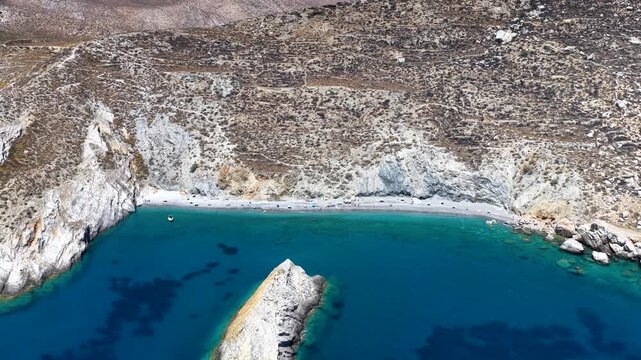 Aerial view of the remote Katergo beach at Folegandros island, Cyclades, Greece, with turquoise sea and white cliffs