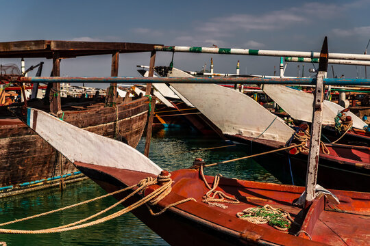 Close-up of  traditional Arabian dhows moored in a harbour in the Arabian Gulf, Al Khor, Qatar