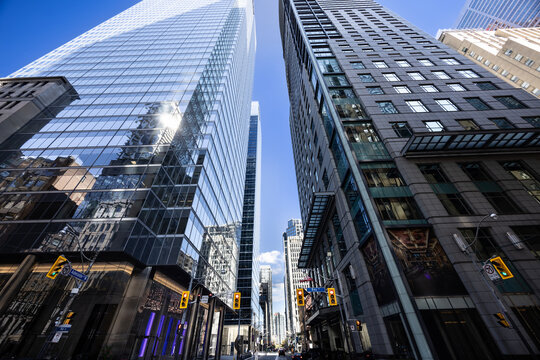 Scenic Toronto financial district skyline in the city downtown near Yonge and King intersection, Bay Corridor and Stock Exchange and banking plaza