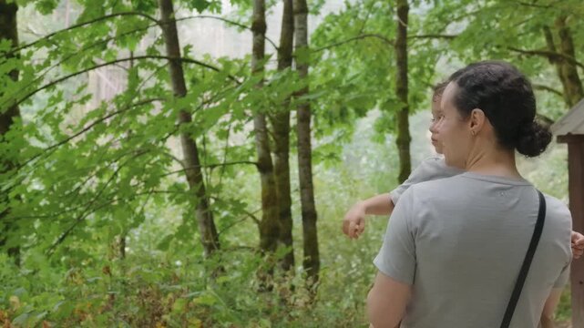 Mother and Child Explore Othello Tunnels Park Near Hope, British Columbia, Pointing at Nature's Wonders
