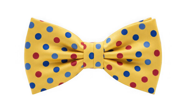 Yellow bow tie with red and blue polka dot pattern isolated on transparent background