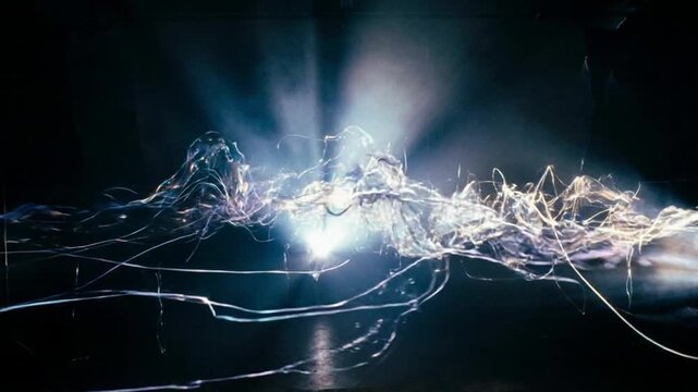A captivating abstract visualization of dynamic sound waves transforming into luminous light patterns, radiating brilliant energy in a dark space.