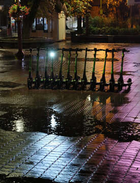 Rain and lights, reflexes of the evening city.