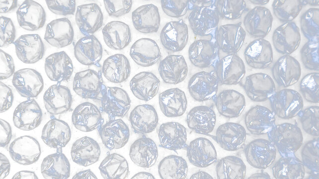 Clear plastic bubble wrap texture with realistic highlights and air pockets for protective packaging, shipping, cushioning, and design overlays