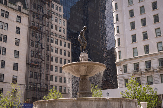 Water flowing from the basins of the Pulitzer Fountain topped by a bronze statue of Pomona on Grand Army Plaza, New York City, United States
