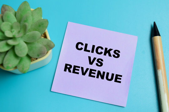 Concept of clicks vs resume write on sticky notes isolated on table.