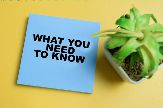 Concept of what you need to know write on sticky notes isolated on table.