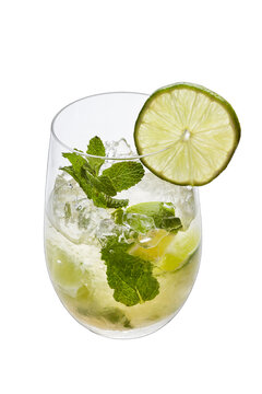 Mojito cocktail glass with lime and mint on white