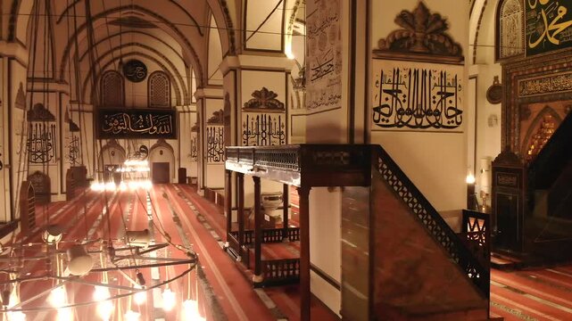 Bursa Ulu Cami interior prayer hall and Islamic mosque details in Bursa Turkey during Ramadan.