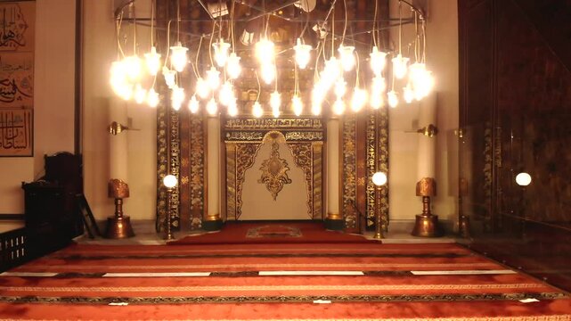 Bursa Ulu Cami interior prayer hall and Islamic mosque details in Bursa Turkey during Ramadan.