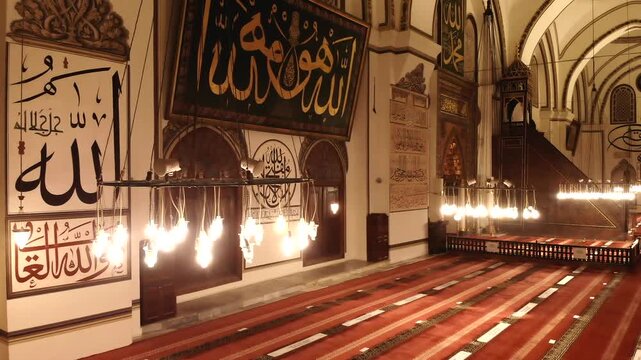 Bursa Ulu Cami interior prayer hall and Islamic mosque details in Bursa Turkey during Ramadan.