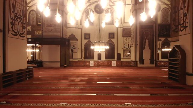 Bursa Ulu Cami interior prayer hall and Islamic mosque details in Bursa Turkey during Ramadan.