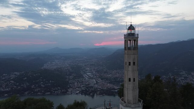 aerial view Volta monument Como sunset dramatic sky architectural landmark illuminated structure tourist destination Lombardy Italy 2