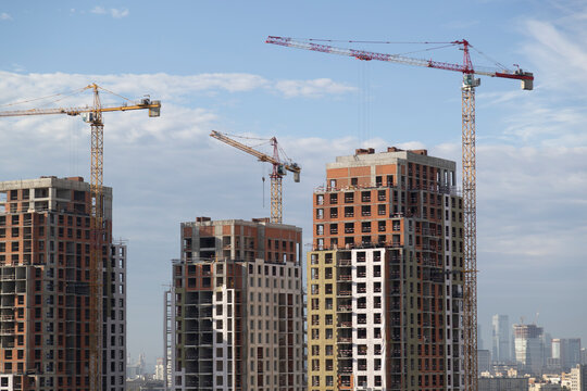 The construction of high‑rise buildings in a large city.
