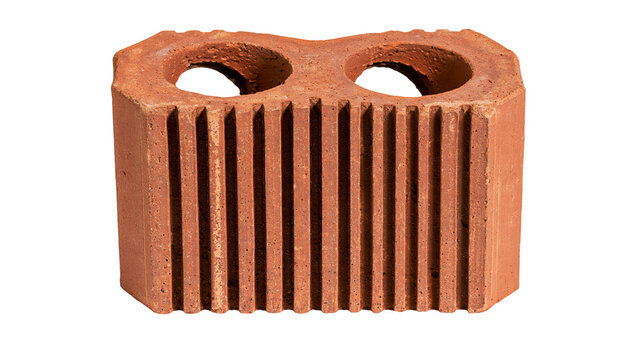 Isolated single red clay brick with two holes and a distinctive ribbed texture on one side