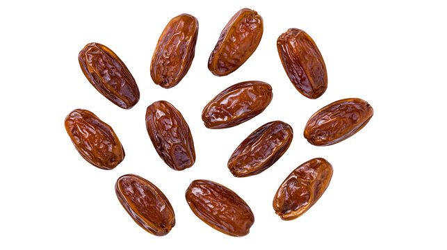 Isolated multiple sweet organic dried dates scattered, healthy snack food, delicious natural fruit