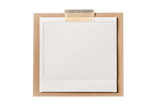 Instant film photo frame taped onto a textured craft paper  with blank space paper texture creative isolated on white background, Clipping Path, png