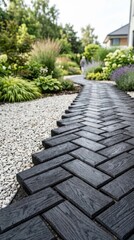 Fototapeta premium Dark wood herringbone garden path with gravel and lush greenery, offering copy space for outdoor advertising.