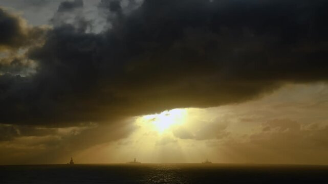 Offshore FPSO Oil Platform at Sunset in the Ocean. Oil and Gas Industry. Oil and gas industry, energy production, and offshore engineering.