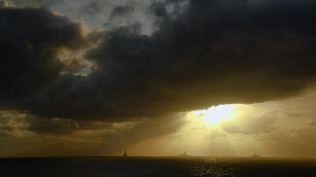 Offshore FPSO Oil Platform at Sunset in the Ocean. Oil and Gas Industry. Oil and gas industry, energy production, and offshore engineering.