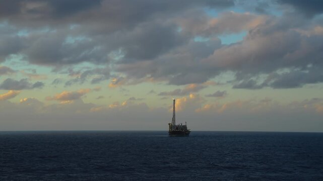 FPSO producing oil alone in the open sea. Oil and Gas Industry. Petroleum industry, offshore energy production, marine operations, and industrial infrastructure concept.