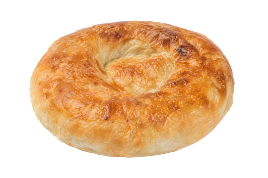 Turkish boyoz, round flattened pastry with flaky blistered pale-golden Isolated on White Background