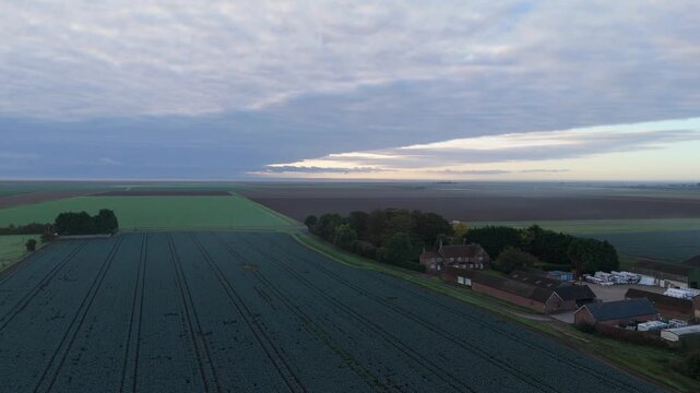 Aerial view captures tranquil countryside at dawn or dusk