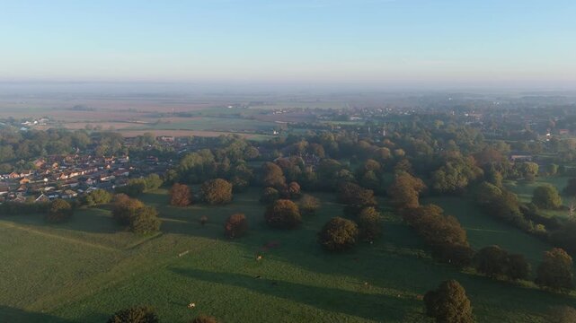 Aerial view of rural English countryside at dawn