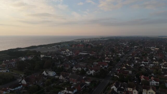 Coastal town viewed from above at sunset