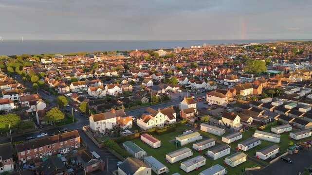 Aerial view of coastal town at sunset